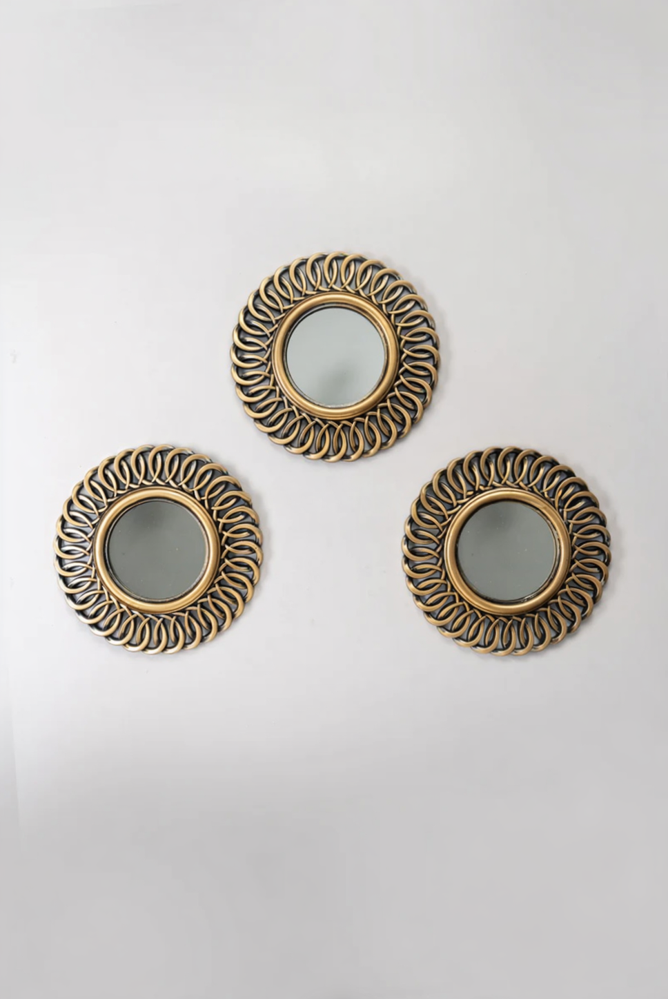 3 Ornate copper wall mirrors