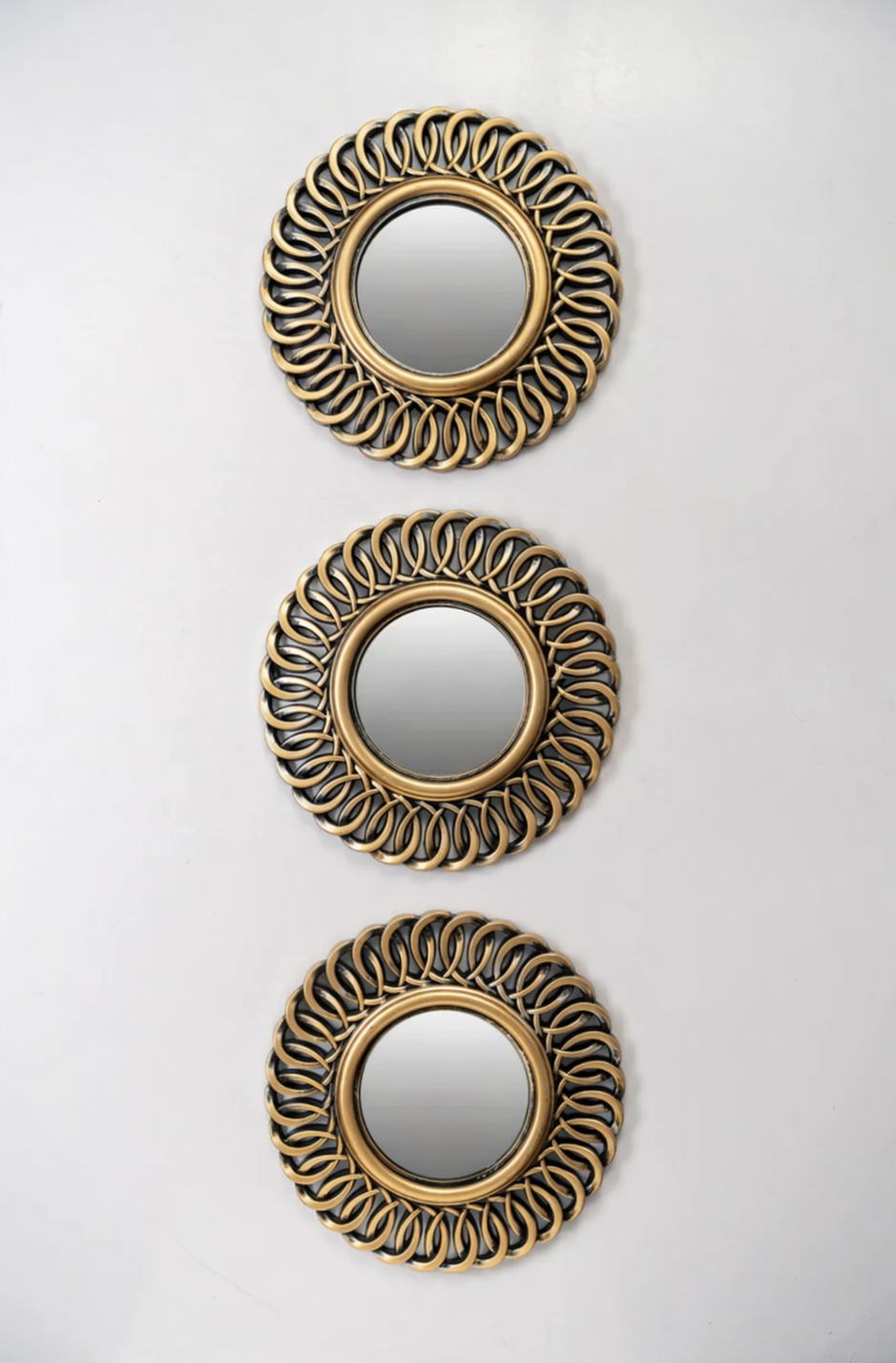 3 Ornate copper wall mirrors